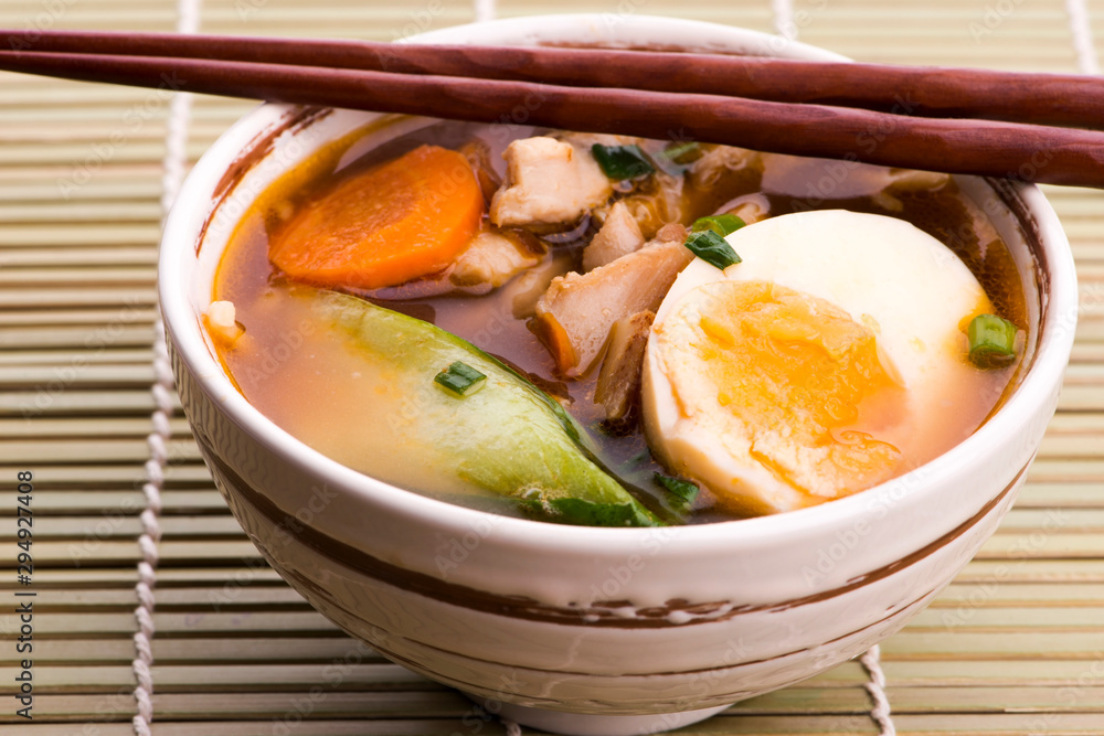 Ramen egg noodle soup dish with salmon fish Ramen egg noodle soup dish with salmon fish