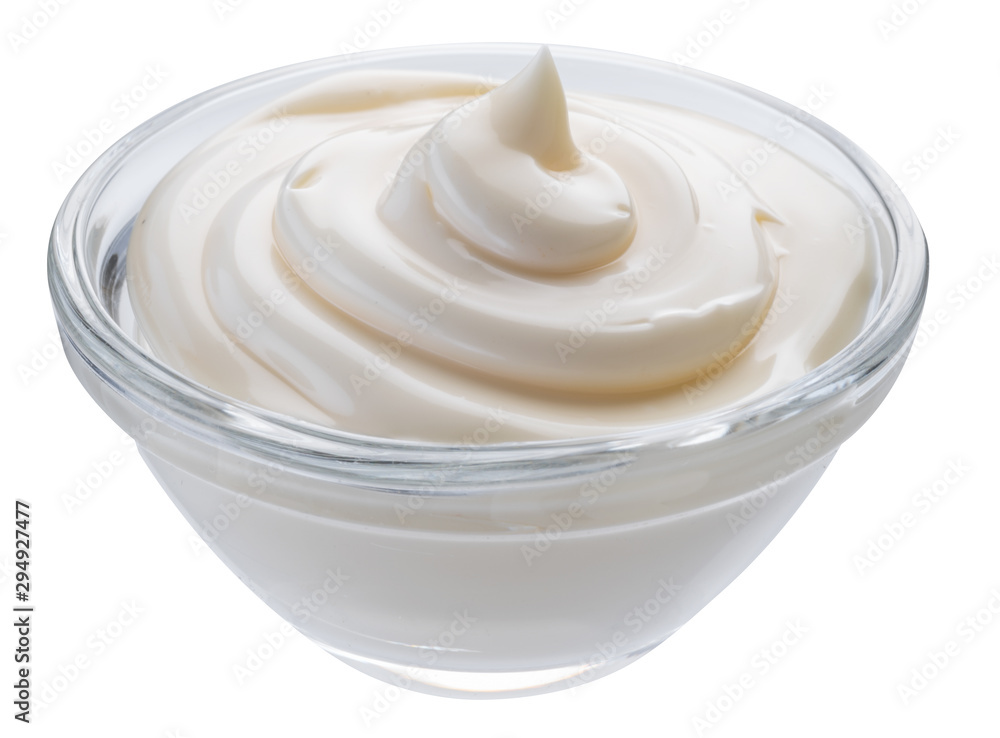 Mayonnaise swirl in glass bowl. Clipping path. Mayonnaise swirl in glass bowl. Clipping path.