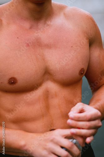 closeup torso of a young inflated guy