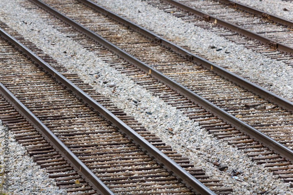 Several Parallel Railroad Train Tracks In A Rail Yard
