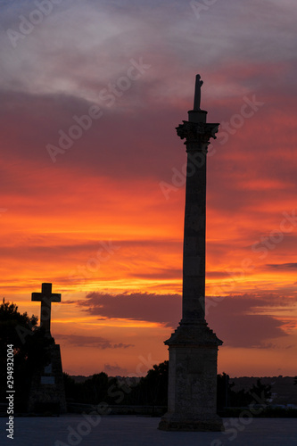Sunset at Santa Maria di Leuca. Santa Maria di Leuca  Colonna Corinzia - Salento  Lecce  Apulia  Italy . Religious symbol  crucifix  cross - Immagine