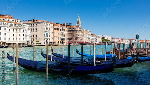 Venetian gondolas moored in Grand Canal