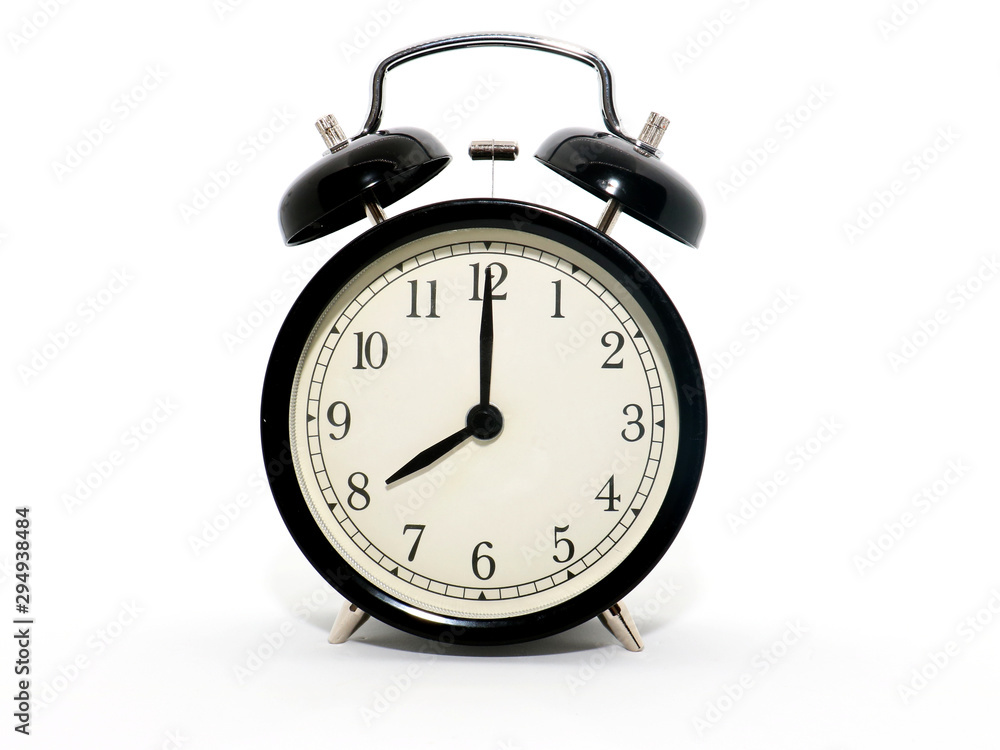 Old-style alarm clock, black and white, it's eight o'clock. Old-style alarm clock, black and white, it's eight o'clock.