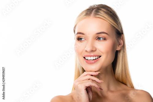 Slika na platnu smiling blonde woman with white teeth looking away isolated on white