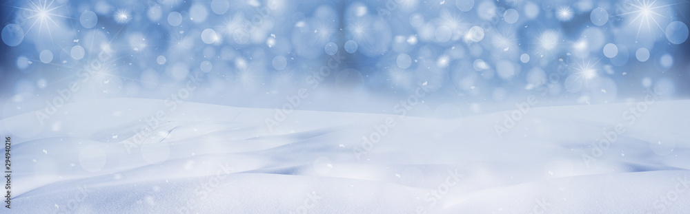 Winter snow background with snow flakes on the blue sky, banner format Winter snow background with snow flakes on the blue sky, banner format