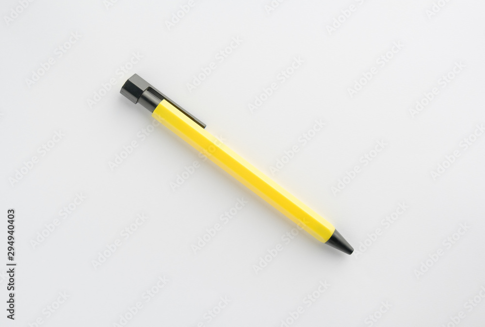 Yellow pen on white background Yellow pen on white background