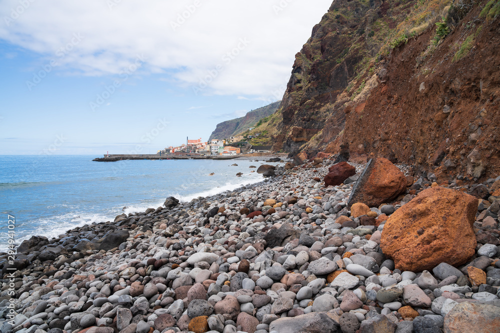 Steep rocky coast with occational rockfalls at Paul do Mar, Madeira