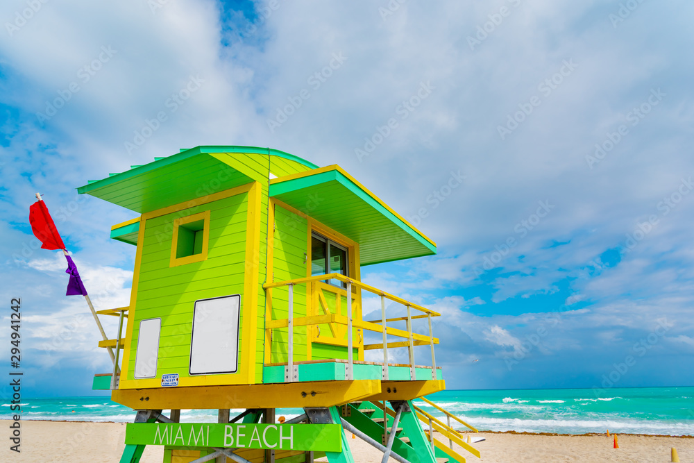 Colorful lifeguard tower under a cloudy sky in South Beach Colorful lifeguard tower under a cloudy sky in South Beach