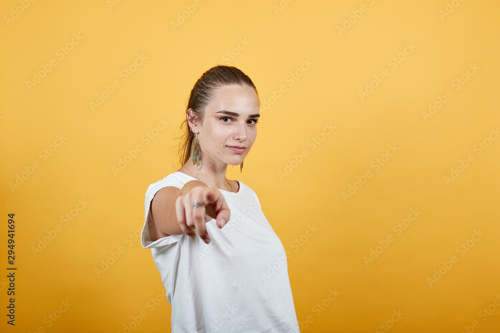 Girl pointing on someone as she believes in that person either person is the one whom she is concerned with sign of dependency. Also particularity of individual Girl pointing on someone as she believes in that person either person is the one whom she is concerned with sign of dependency. Also particularity of individual