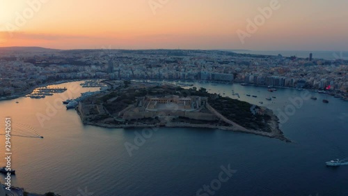 Aerial view of Fort Manoel (Maltese: Forti Manoel or Fortizza Manoel) - is a star fort on Manoel Island in Gzira, Malta at sunset photo