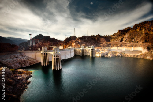 Large lake at a hydroelectric power plant in a remote rocky landscape. photo