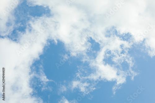 Blue sky with smoky clouds on whole background