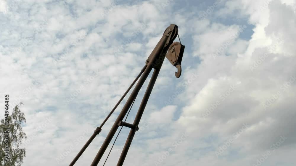 25201_The_hook_of_an_old_rusty_crane_in_the_garage.mov 25201_The_hook_of_an_old_rusty_crane_in_the_garage.mov