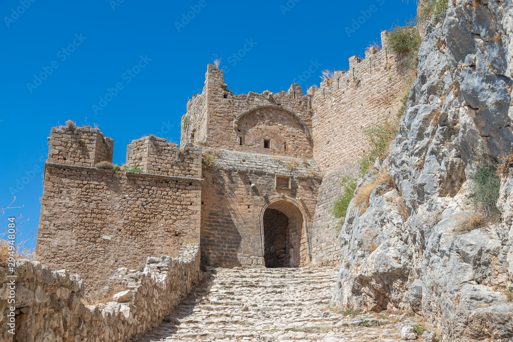 The ruins of the ancient Acrocorinth, the fortress of city Corinth in Greece