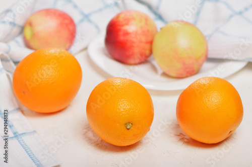 juicy oranges on a white background. sweet big tangerines on the table.orange citrus fruits on a light texture.