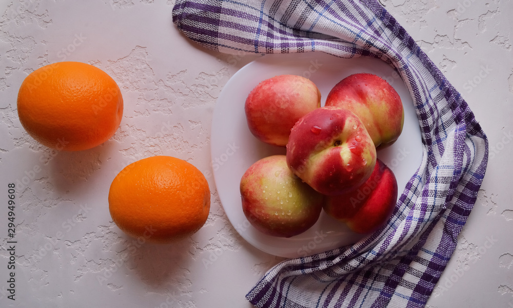 Ripe juicy nectarine with water drops.Fresh fruit nectarines healthy food.Vitamins are food for vegetarians. Ripe juicy nectarine with water drops.Fresh fruit nectarines healthy food.Vitamins are food for vegetarians.