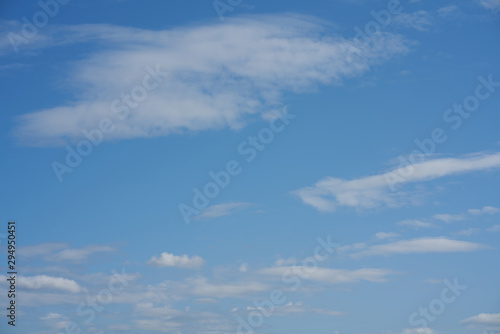 Light cirrus clouds on a blue day sky. Blue sky and clouds