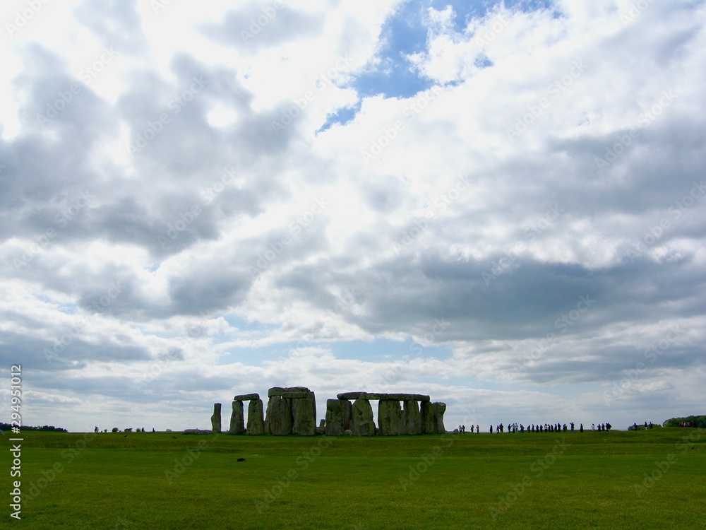 People are visiting Stonehenge in  Wiltshire, England which is one of the biggest mysteries of history.