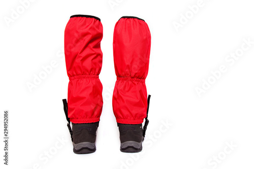 giaters and hiking boot on white background photo