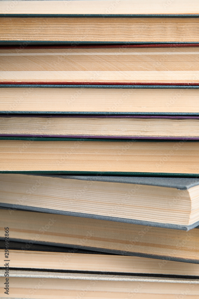 Stack of hardcover books as background, closeup Stack of hardcover books as background, closeup