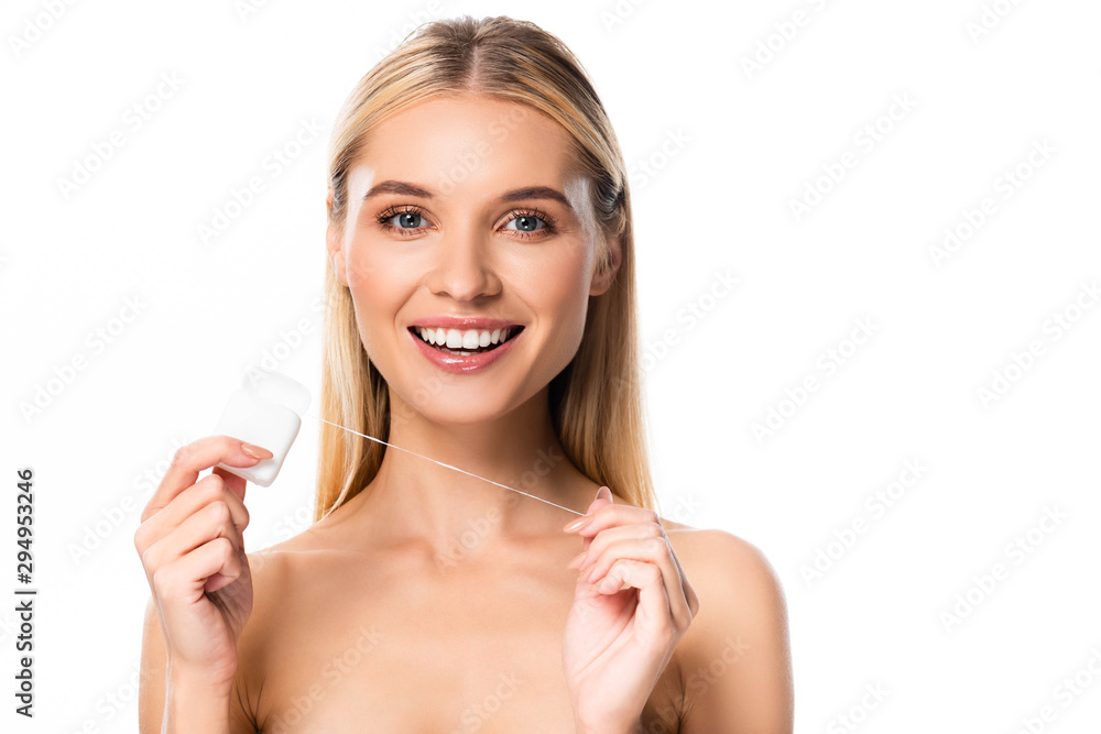 smiling naked woman with dental floss isolated on white smiling naked woman with dental floss isolated on white