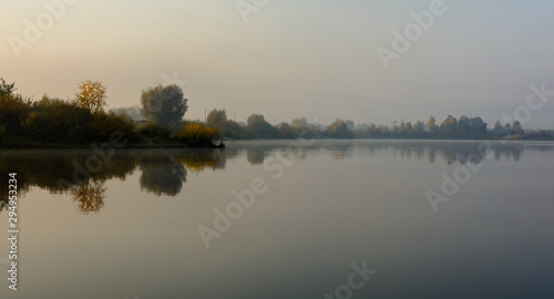Morning fog on the river. Autumn