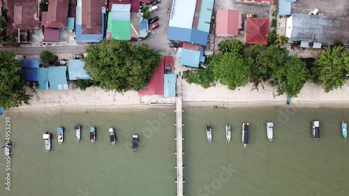 Aerial view fishing village and bridge at Teluk Kumbar. photo
