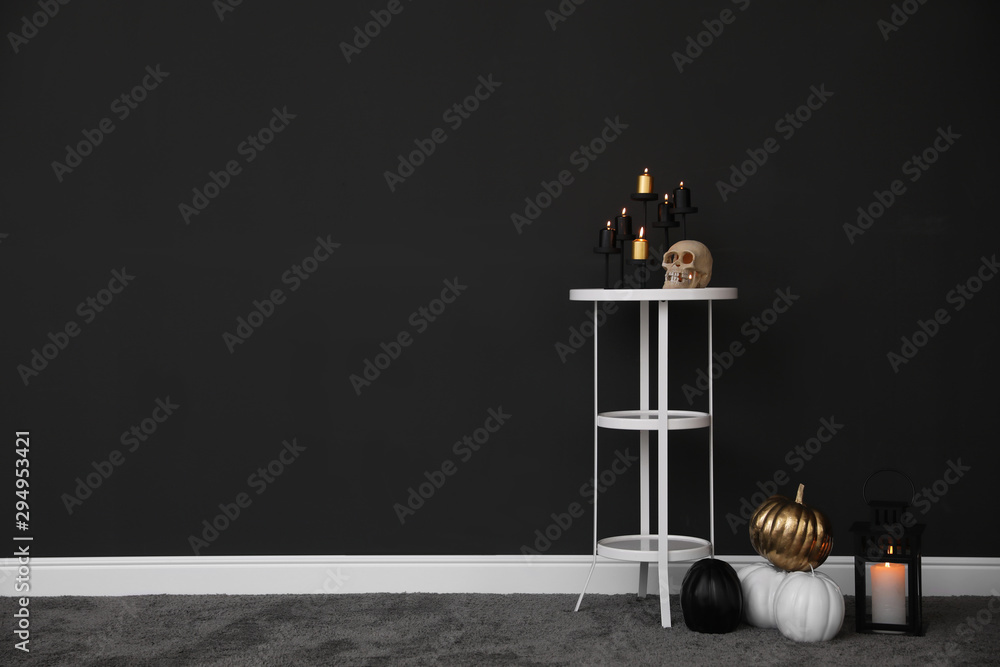 Halloween decor in room, space for text. Idea for festive interior