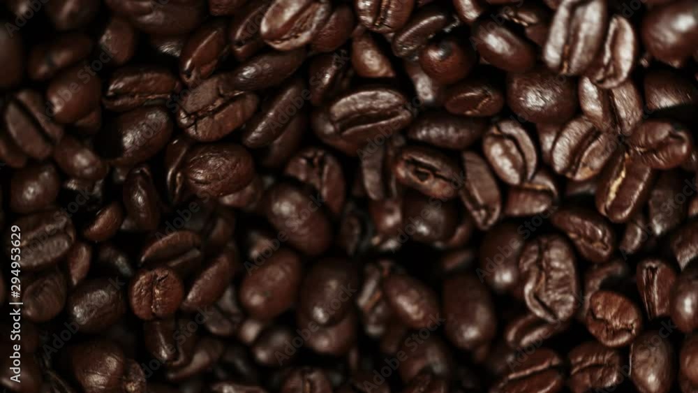 Super Slow Motion Shot of Rotating Coffee Beans in the Grinder at 1000fps Super Slow Motion Shot of Rotating Coffee Beans in the Grinder at 1000fps