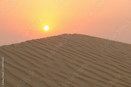 Sunset over a dune ridge in the Rub Al Khali Desert  Abu Dhabi