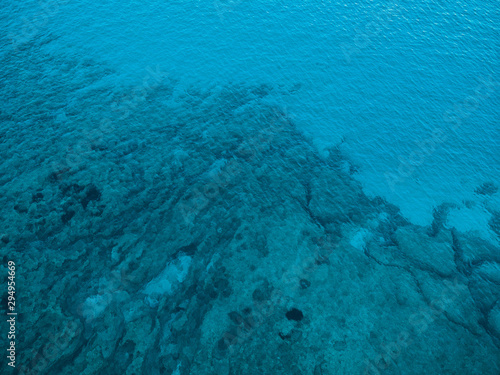 Fototapeta Naklejka Na Ścianę i Meble -  blue water in the ocean - picture taken by a drone