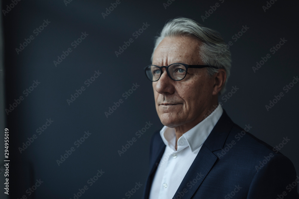 Portrait of a senior businessman looking away Portrait of a senior businessman looking away