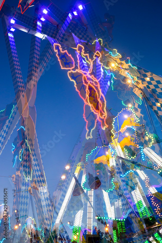 Germany, Wuerzburg, Kiliani Fair in the evening, blurred motion photo