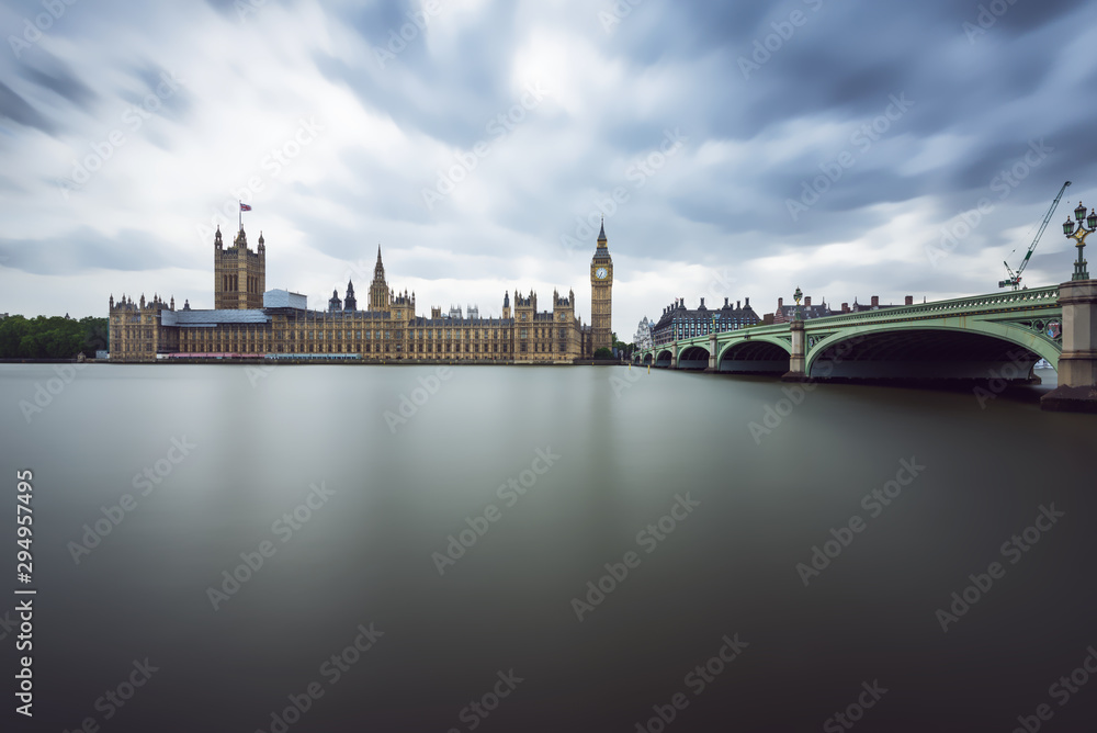 Fototapeta premium Panoramic view of Houses of Parliament, Big Ben and Westminster Bridge with reflection, London
