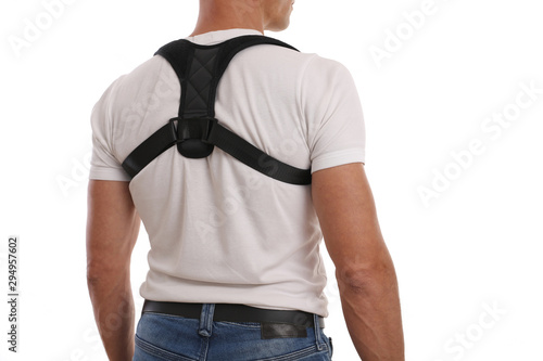 Man with posture corrector. Scoliosis, Kyphosis treatment photo