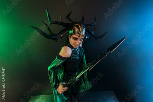 beautiful woman in halloween cosplay costume.  goddess of death 