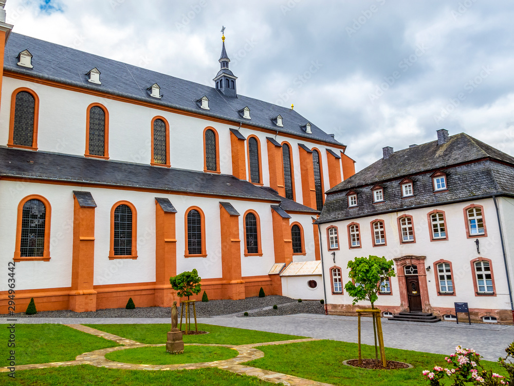 Old building next to St. Salvator Basilica, the former abbey church of the Pruem Benedictine Abbey at Pruem, Germany, parish house
