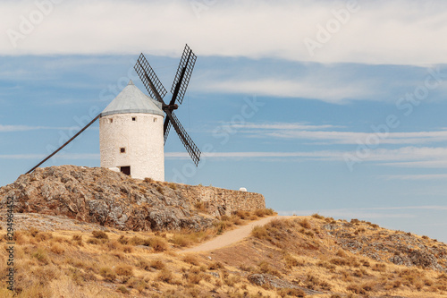 old windmill in the landscape of consuegra photo