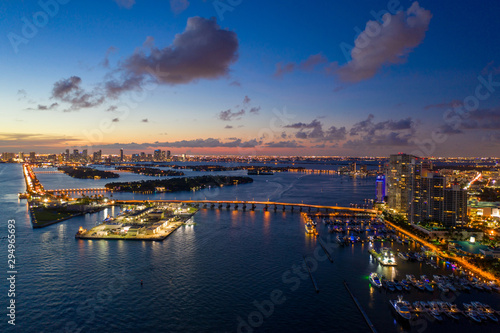 Beautiful night in MIami Beach image shows bridges buildings and islands on Biscayne Bay
