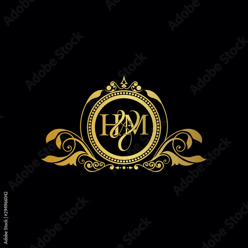 Initial letter HM logo luxury vector mark, gold color elegant classical symmetric curves decor.