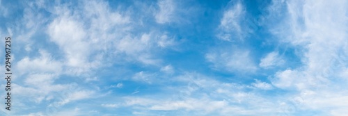 Panorama of blue sky with white clouds as background or texture