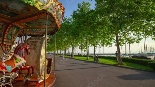 sunset light lausanne city famous walking bay carousel panorama 4k timelapse switzerland