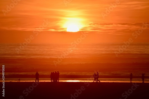 People on beach at sundown 2- Seaside, Oregon