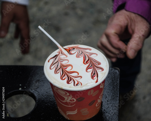 buying a coffee in the street