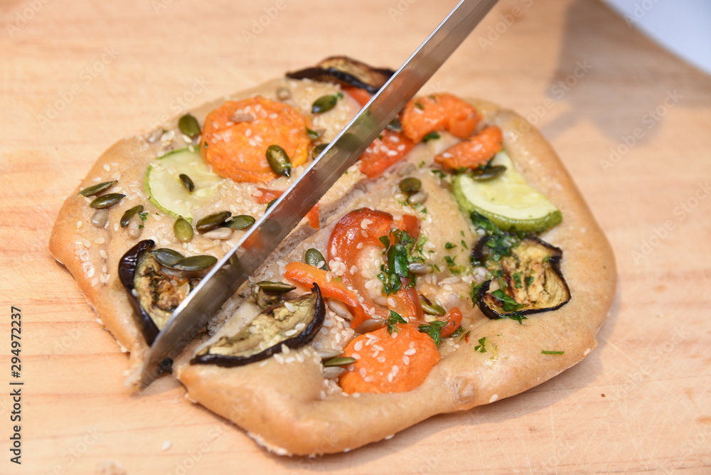 pizza bread with cheese and vegetables
