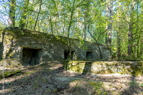 Old abandoned ruins of fortress in the forest, in Latvia.
