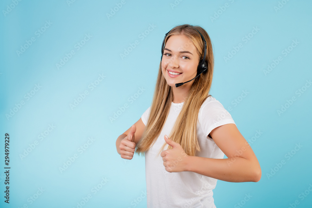 friendly smiling blonde call center operator with headset isolated over blue