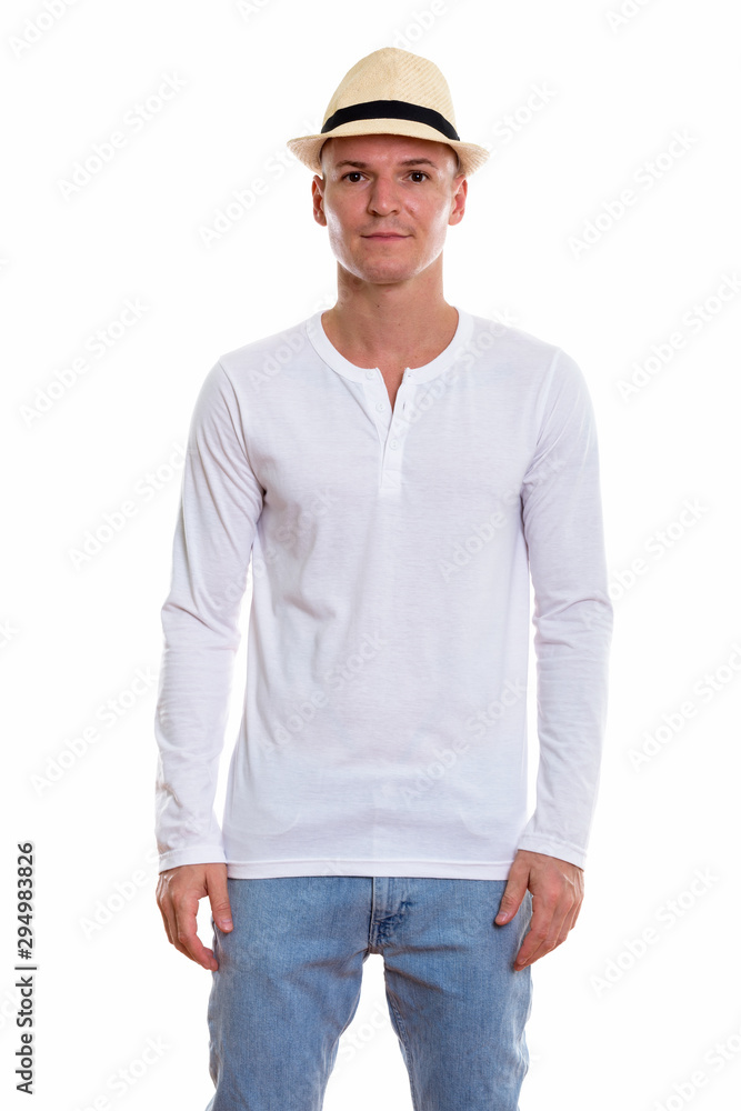 Studio shot of young handsome man standing Studio shot of young handsome man standing