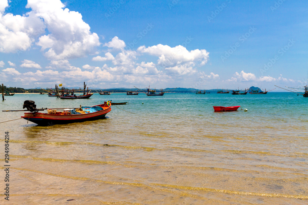 Fototapeta premium Beach fishing boat and cloud sky at Bang Boet beach