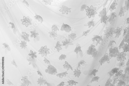 Details of the bride dress fabric and beautiful embroidery wedding concept used as a background for illustrations